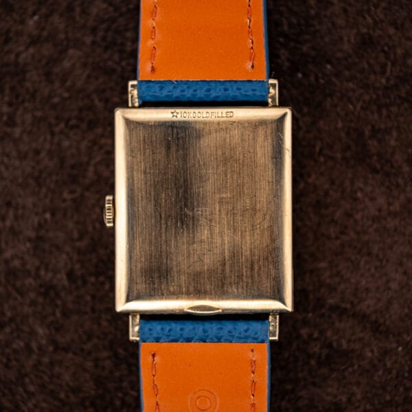 Longines 3217-428 outer caseback stamped with a star and 10K GOLD FILLED, brushed finish with fine scratches