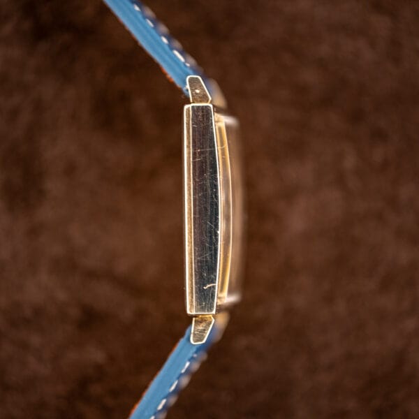 Side view of Longines 3217-428 with domed acrylic crystal and beveled gold filled case flank
