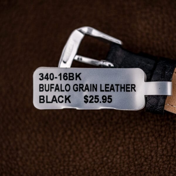 Aftermarket black buffalo grain leather strap in sixteen millimeter fitted to the vintage Movado.