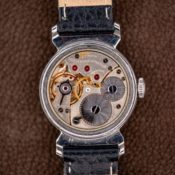 Movado manual wind movement, fifteen jewels, unadjusted and Swiss made with blued hairspring.