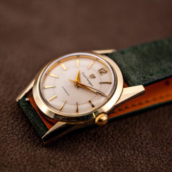 Girard-Perregaux Gyromatic three-quarter view with signed gold crown and long tapered lugs