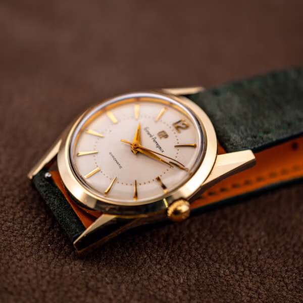 Girard-Perregaux Gyromatic three-quarter view with signed gold crown and long tapered lugs