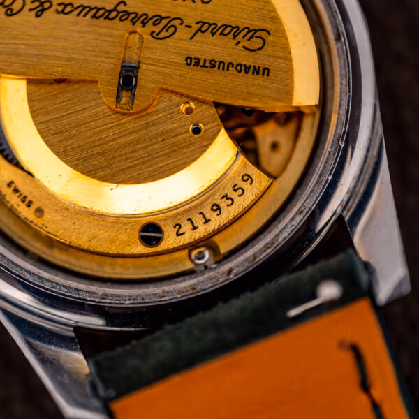 Girard-Perregaux Gyromatic movement detail with script rotor signature and movement serial 2119359