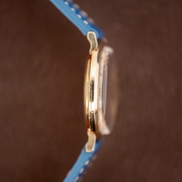 Vintage Longines 1044 case profile showing slim gold filled band and flared faceted lugs