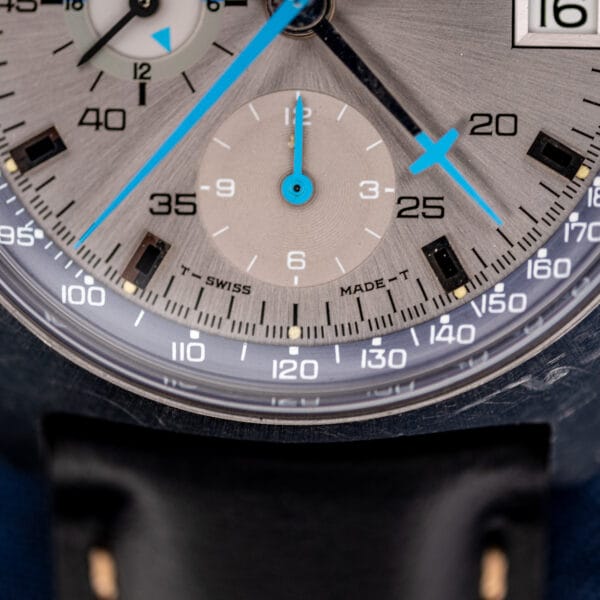 Omega 176.007 twelve hour chronograph totaliser at six o clock with dial text reading T SWISS MADE T