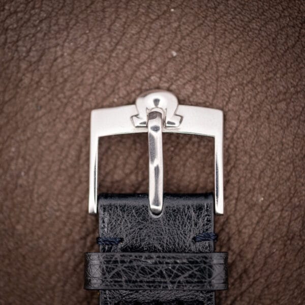 Polished steel buckle fitted to the black ostrich strap on this Omega Seamaster 166.032