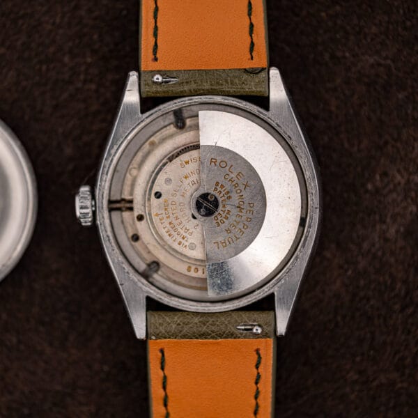 Rolex 6085 automatic movement in case, full rotor signed ROLEX PERPETUAL CHRONOMETER SWISS PATENTED