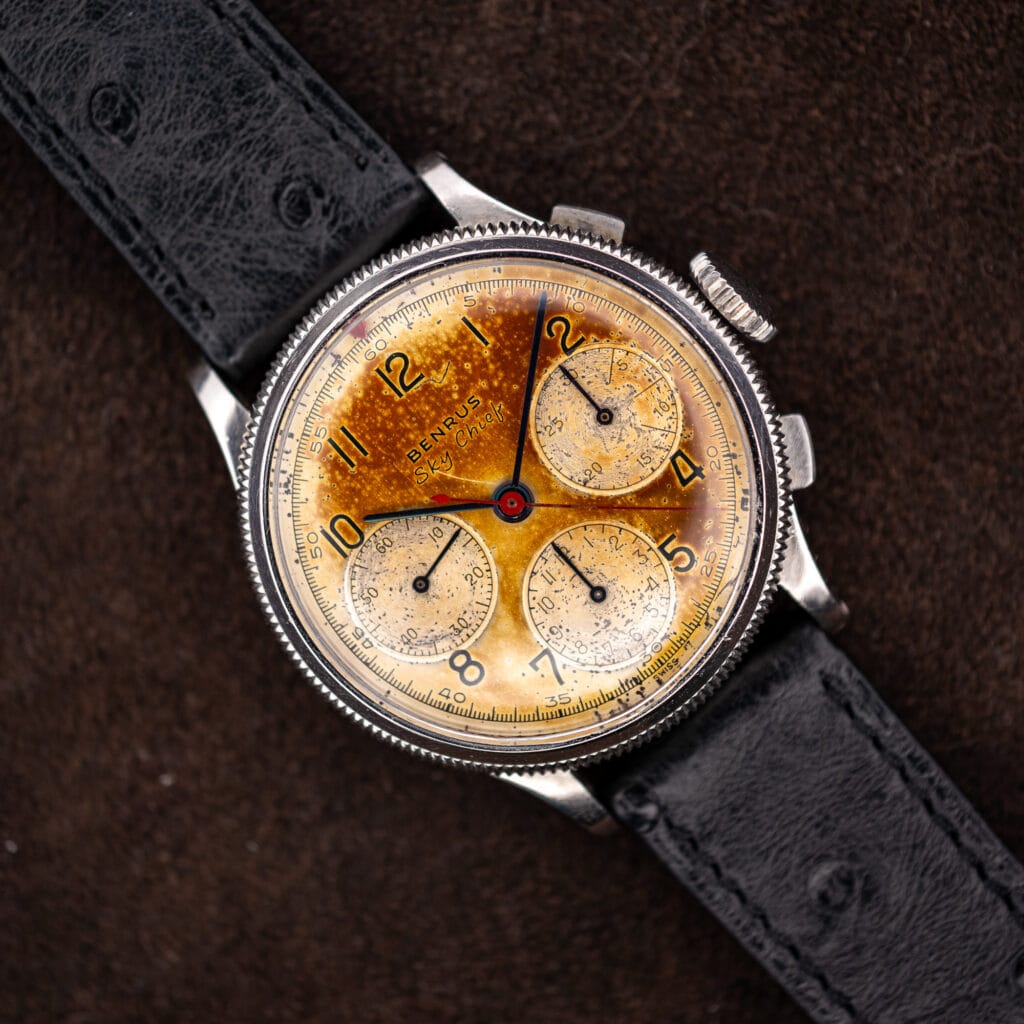 Benrus Sky Chief chronograph with tropical amber dial, coin-edged bezel and black ostrich leather strap