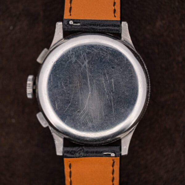 Benrus Sky Chief plain stainless steel snap caseback carrying decades of fine hairline wear