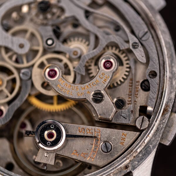 Benrus MODEL GH-4 movement macro showing SEVENTEEN 17 JEWELS and the AXZ US import code