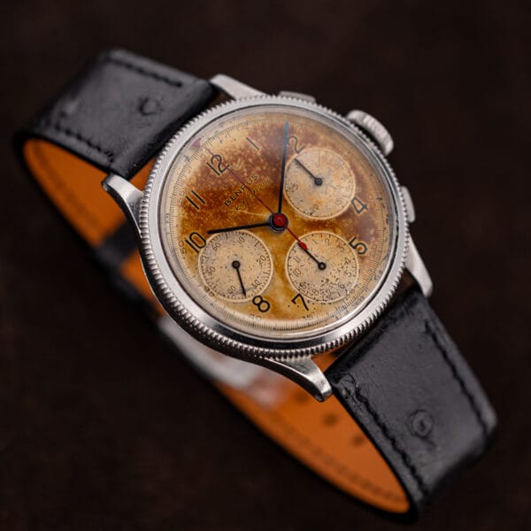 Vintage Benrus Sky Chief pilot chronograph angled to show the coin-edged bezel milling
