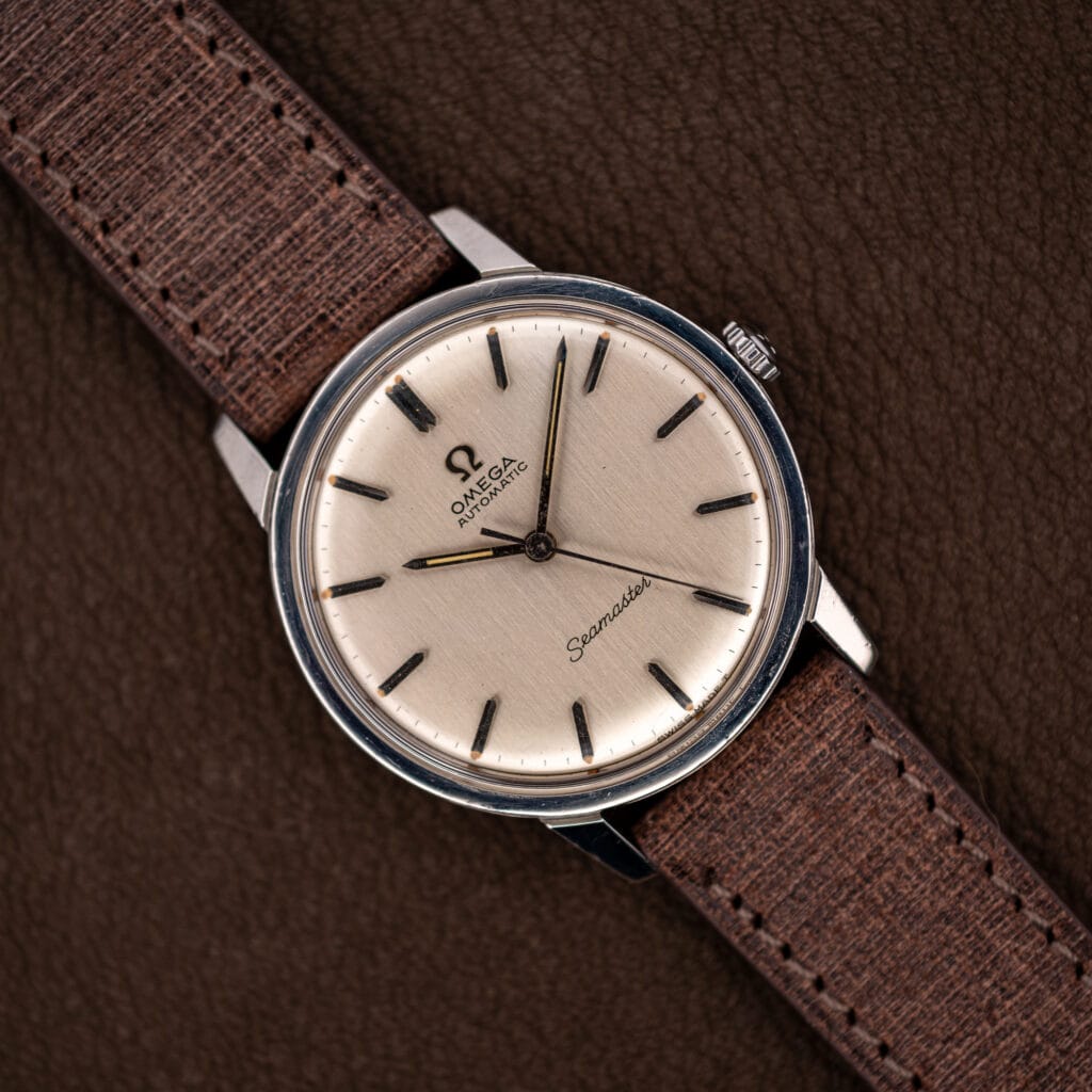 Omega Seamaster 165.002 silver dial with applied faceted batons on a brown grained leather strap