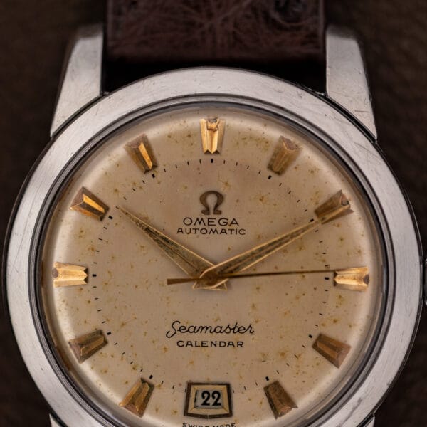 Omega 2757-2 SC eggshell dial under a domed crystal with gold dauphine hands and wedge markers