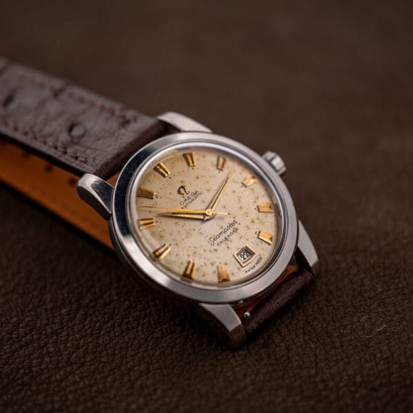Omega Seamaster Calendar stainless steel case and eggshell dial shot from a low three-quarter angle