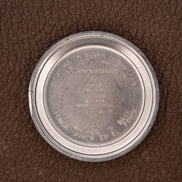 Omega inner caseback stamped ACIER INOXYDABLE, FAB. SUISSE, PATENT + APPLIED and reference 2757-2 SC