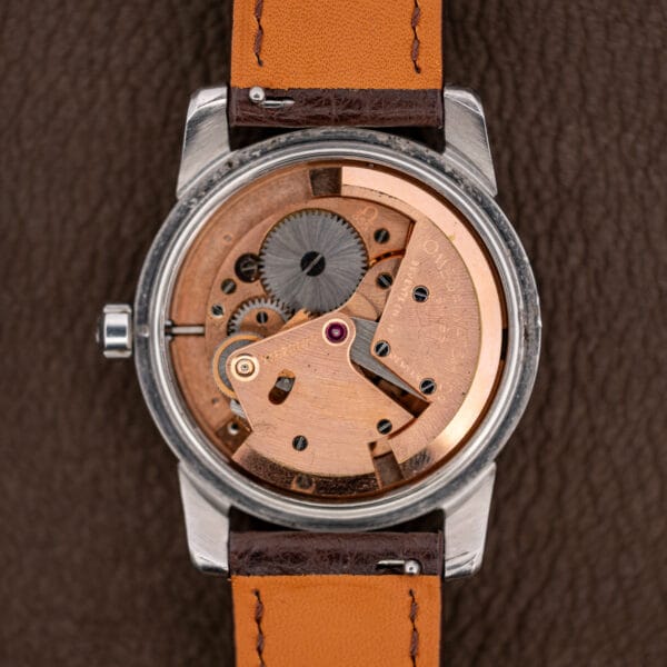 Omega caliber 355 bumper automatic movement in rose gilt, signed OMEGA WATCH CO with seventeen jewels