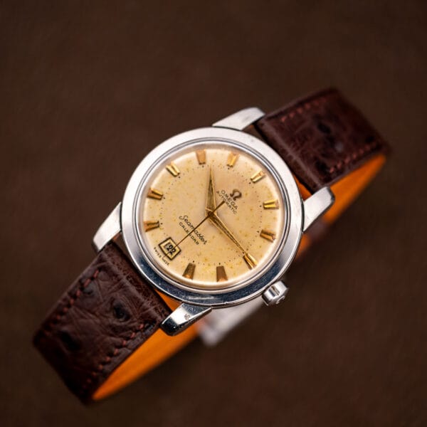 Top-down view of the Omega Seamaster Calendar 2757-2 SC, dial and ostrich strap filling the frame