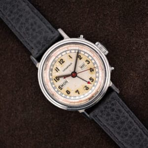 Movado triple calendar ref. 14819 with Tiffany & Co. signed eggshell dial, day and month windows, black leather strap