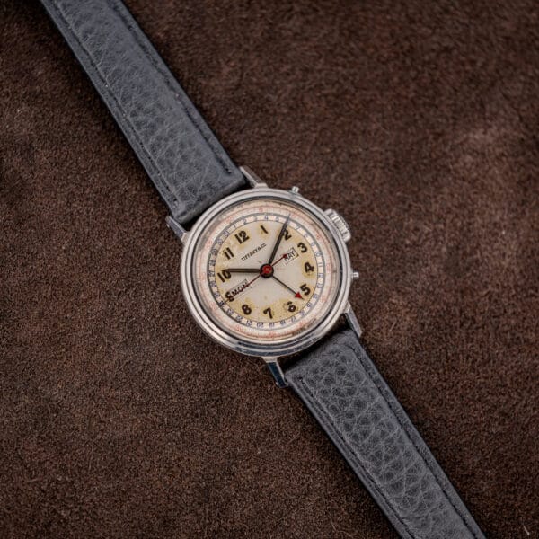 Movado triple calendar 14819 on black leather strap, stepped steel bezel and calendar correctors beside the crown