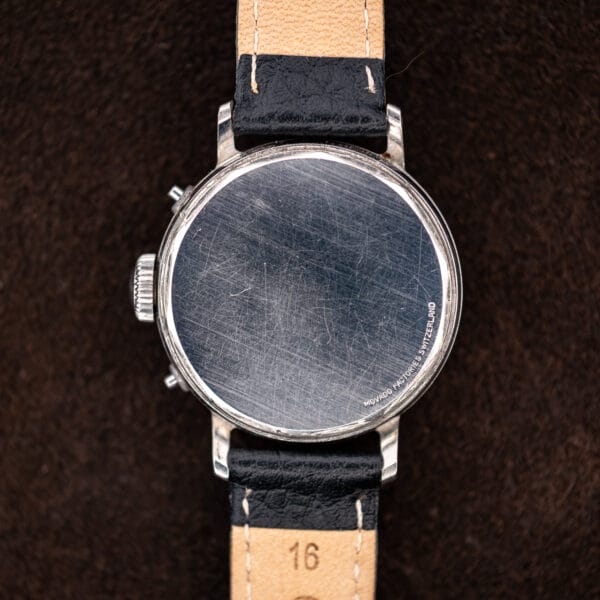 Movado 14819 steel caseback stamped MOVADO FACTORIES SWITZERLAND with hairline wear from decades of use