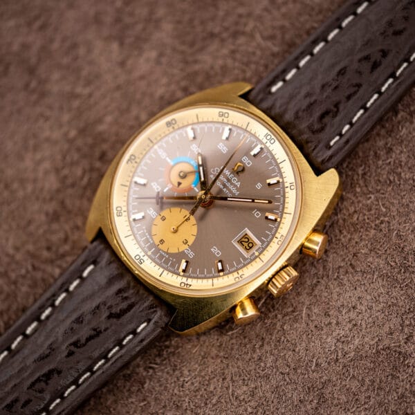 Three quarter view of the gold plated Omega Seamaster chronograph 176.007, date reading 29 at three