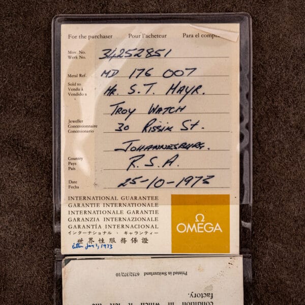 Omega guarantee card filled by hand: movement 34252851, ref MD 176 007, Troy Watch Johannesburg, October 1973