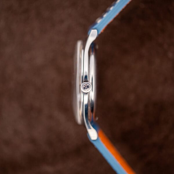 Hamilton Thin-O-Matic case profile at the crown, showing the slim micro-rotor case height in stainless steel