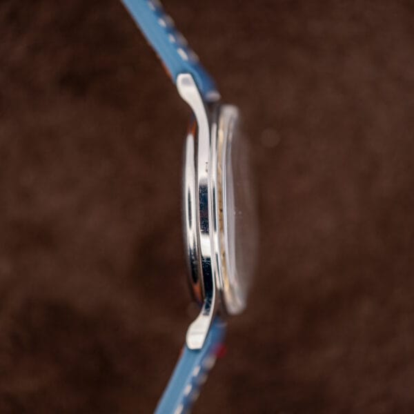 Side profile of the Hamilton cal. 663 Thin-O-Matic showing domed acrylic crystal and snap-on caseback edge