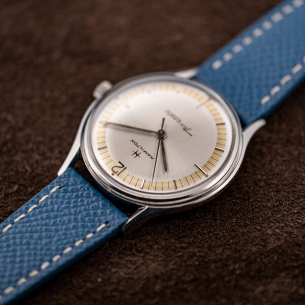 Hamilton Thin-O-Matic cal. 663 shown inverted, blue grained leather strap with cream contrast stitching