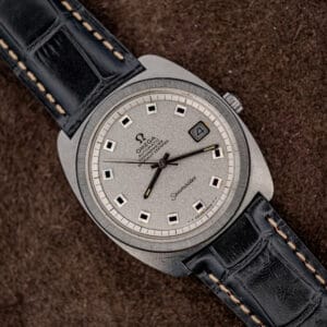 Omega Seamaster 168.035 Jumbo angled view with frosted silver dial, black square markers, and black leather strap
