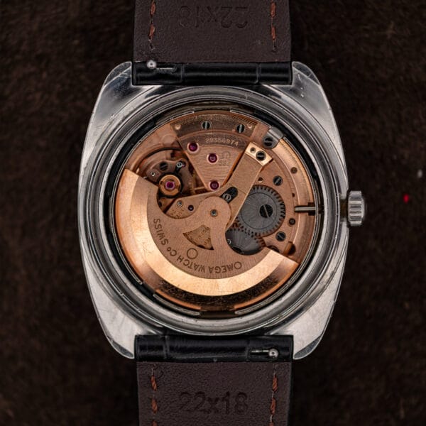 Omega caliber 564 automatic movement in the Seamaster 168.035 with signed copper-toned rotor