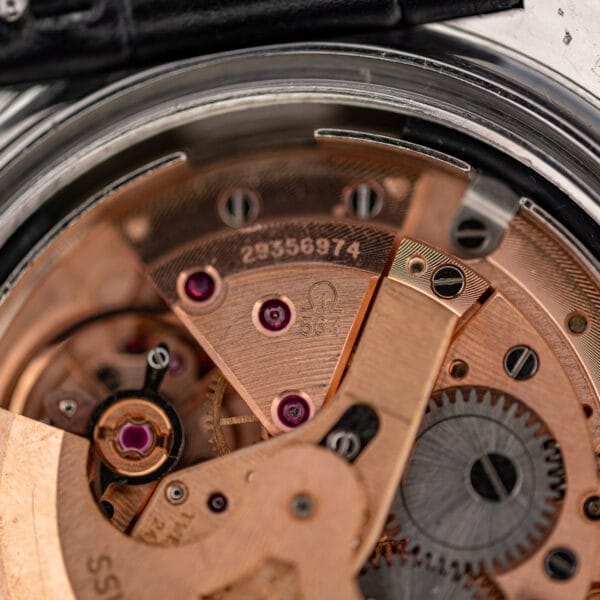 Omega caliber 564 bridge macro showing the 564 stamp and movement serial number