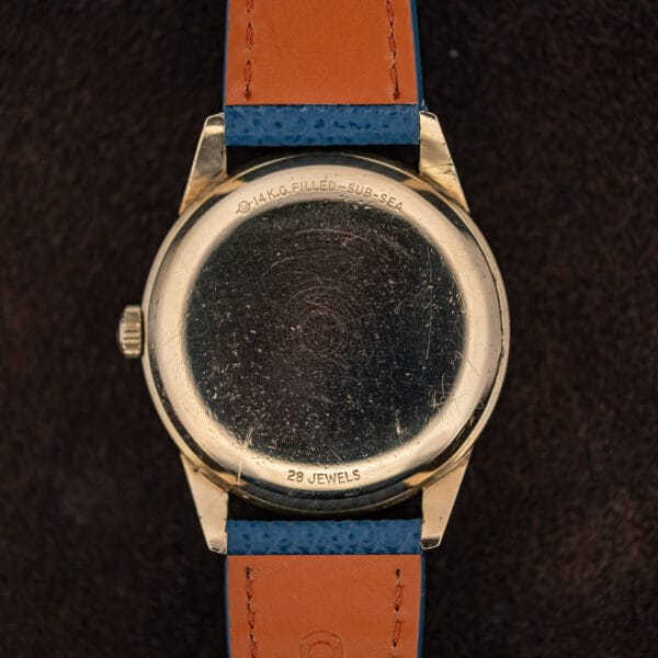 Caseback of the Movado Kingmatic stamped 14K G. Filled Sub-Sea above a 28 Jewels marking