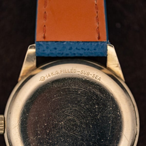 Detail of the caseback stamping reading 14K G. Filled Sub-Sea with the case maker cartouche