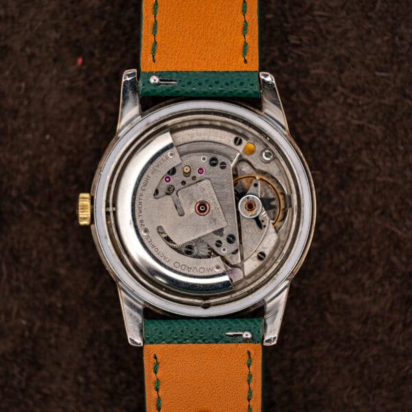 Movado Kingmatic automatic movement marked MOVADO FACTORIES and TWENTY-EIGHT 28 JEWELS beneath its full winding rotor