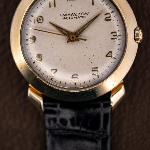 Macro view of the Hamilton K-455 silvered dial with age-warmed finish and black minute track