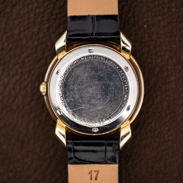 Stainless steel caseback stamped Hamilton, Shock-Resistant, Water-Proof and 10k gold filled bezel