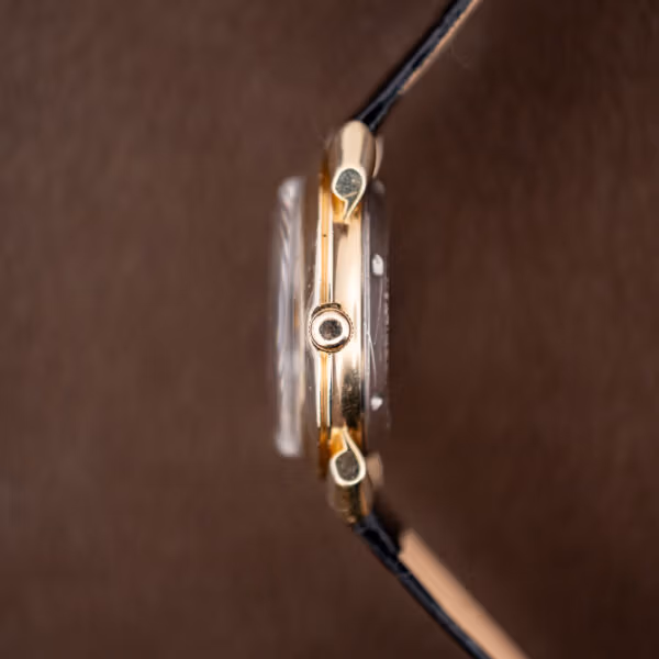 Side profile of the Hamilton K-455 case showing case depth and sculpted lug facets