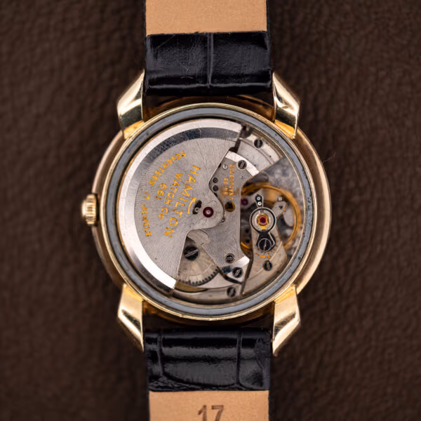 Hamilton caliber 661 automatic movement inside the open K-455 case with the rotor visible
