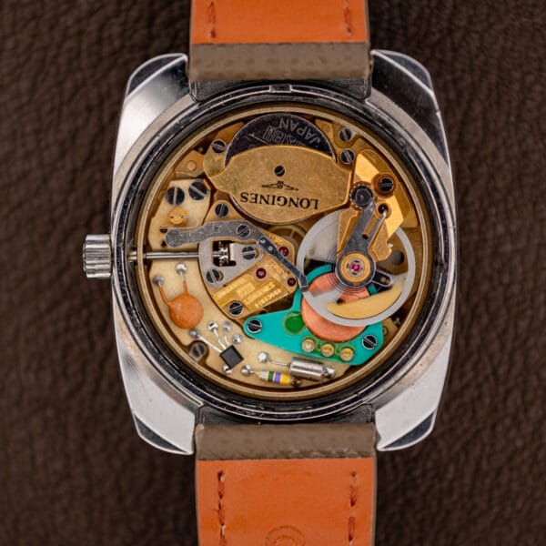 Caliber 7212 in the case with balance wheel, copper coil, transistor and battery