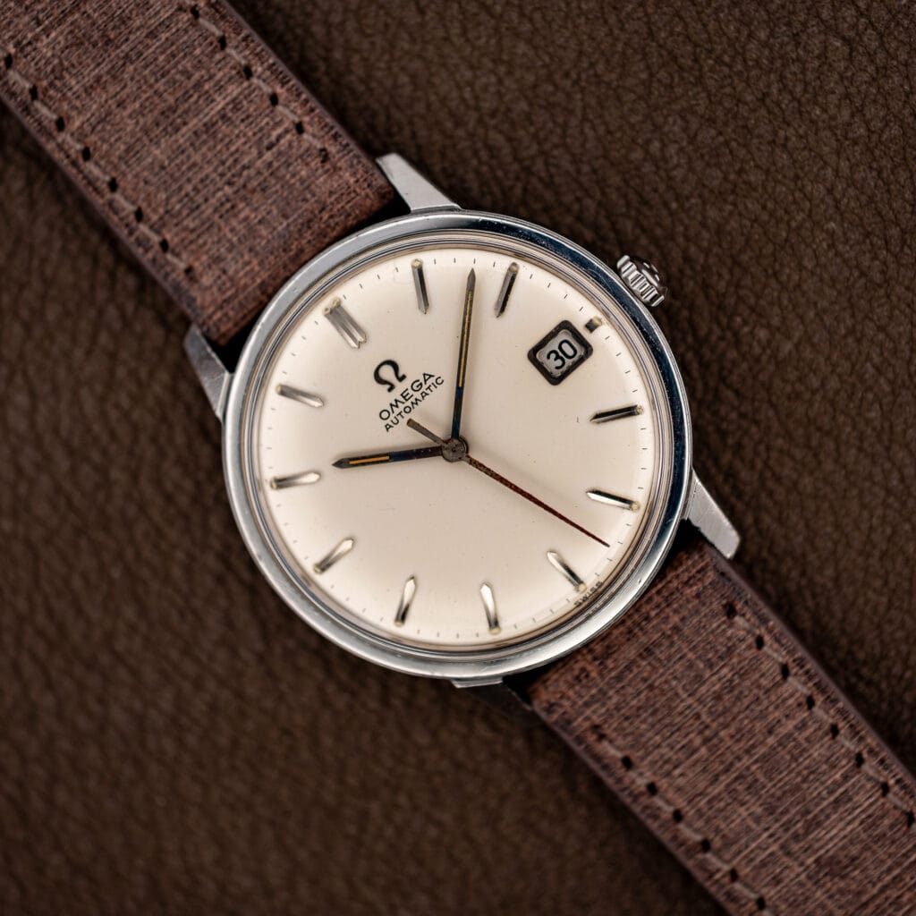 Omega Seamaster 166.002 automatic with white dial and brown Babele leather strap, angled front view