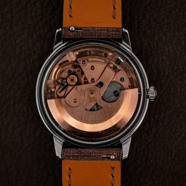 Omega caliber 560 automatic movement with signed full rotor and rose gilt bridges