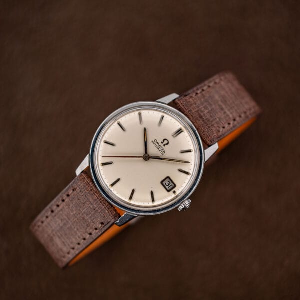 Front view with the date at 31 and aged cream lume plots on the applied markers