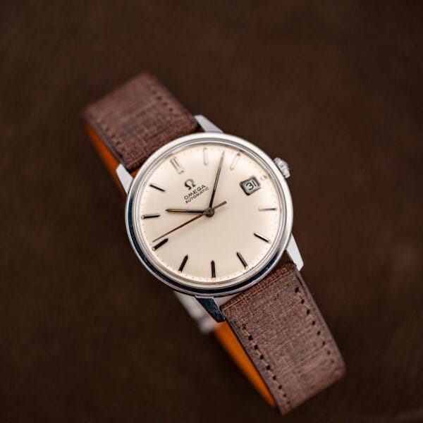 Omega Seamaster 166.002 in stainless steel on brown leather, straight-on product view