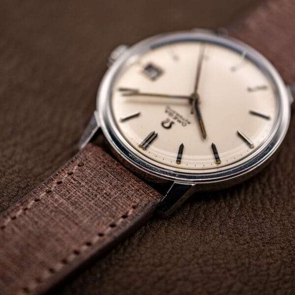 Low-angle view on brown Babele leather with contrast stitching