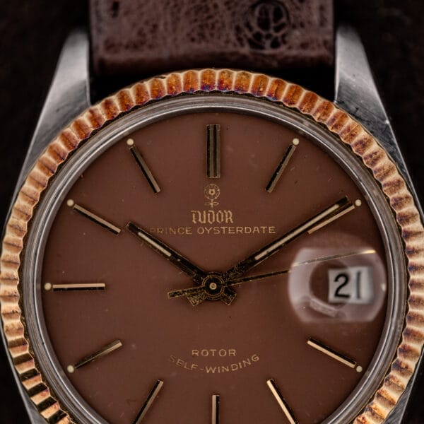 Tudor Prince Oysterdate 7990/3 chocolate dial close-up showing the rose logo and gold baton hands