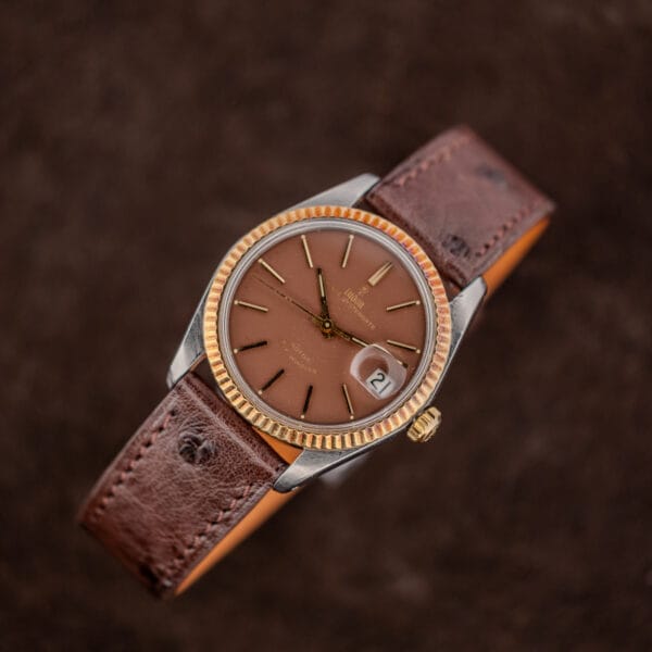 Tudor Prince Oysterdate 7990/3 elevated view on a chocolate brown ostrich strap