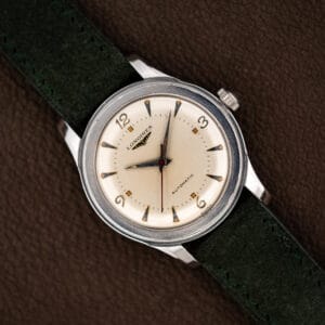 Longines Sei Tacche 6280-5 cream dial with applied numerals, red sweep seconds hand and forest green suede strap