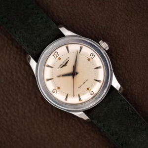 Longines Sei Tacche 6280-5 cream dial with applied numerals, red sweep seconds hand and forest green suede strap