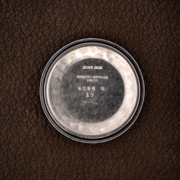Longines 6280-5 inner caseback stamped ACIER INOX, LONGINES WATCH CO. SWISS with watchmaker service marks
